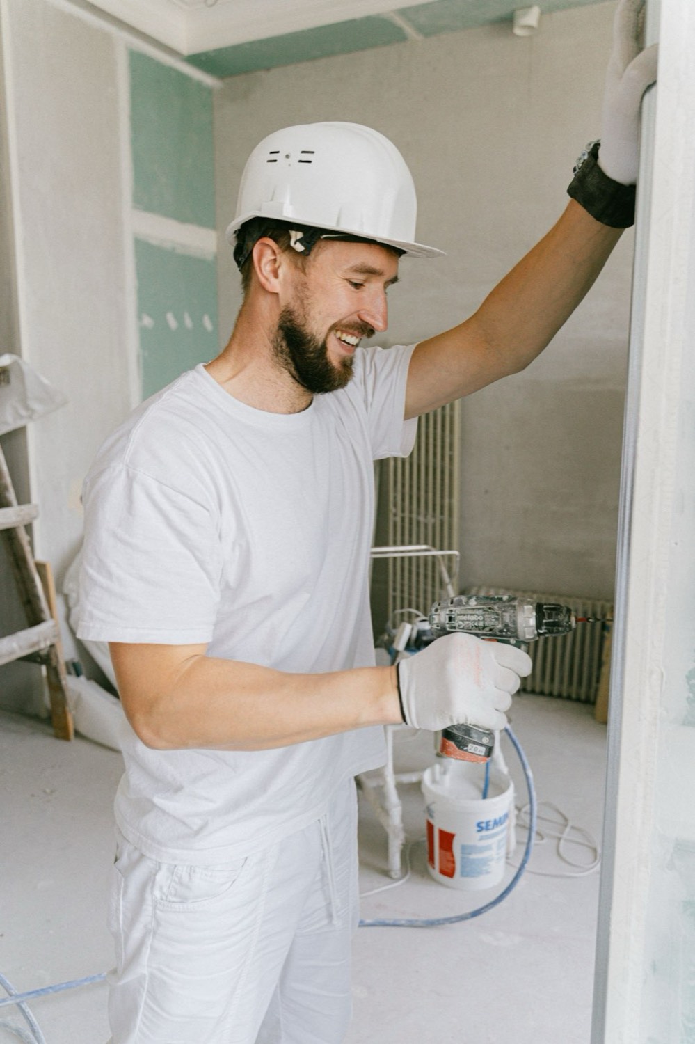 AKL Construction Services contractor on a residential job site